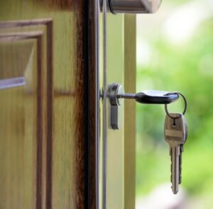 Key in door of sold home