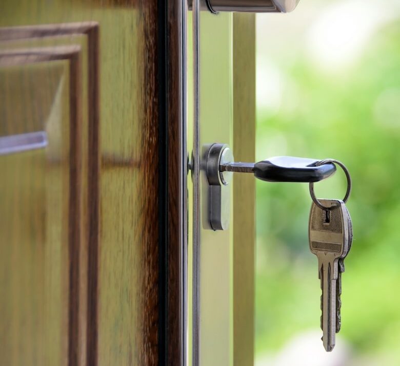 Key in door of sold home